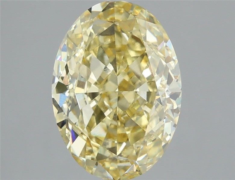 Loose Diamond - OVAL 3.09ct Fancy Yellow VS1: Loose Diamond - OVAL 3.09ct Fancy Yellow VS1 Source: This is a real non-mined Diamond that has been grown in a lab Shape: OVAL Carats: 3.09 Color: Fancy Yellow Certification: IGI Video: