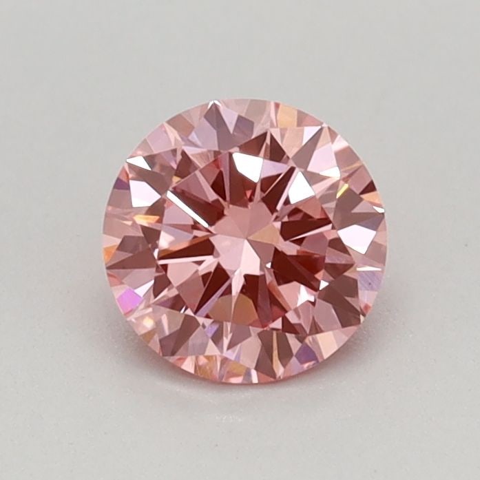 Loose Diamond - ROUND 0.45ct Fancy Vivid Pink VS1: Loose Diamond - ROUND 0.45ct Fancy Vivid Pink VS1 Source: This is a real non-mined Diamond that has been grown in a lab Shape: ROUND Carats: 0.45 Color: Fancy Vivid Pink Certification: IGI Video: