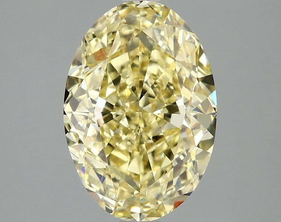 Loose Diamond - OVAL 3.1ct Fancy Vivid Yellow VS1: Loose Diamond - OVAL 3.1ct Fancy Vivid Yellow VS1 Source: This is a real non-mined Diamond that has been grown in a lab Shape: OVAL Carats: 3.1 Color: Fancy Vivid Yellow Certification: IGI Video: