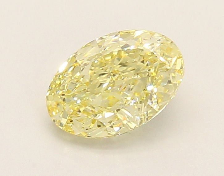 Loose Diamond - OVAL 1.07ct Fancy Yellow VS1: Loose Diamond - OVAL 1.07ct Fancy Yellow VS1 Source: This is a real non-mined Diamond that has been grown in a lab Shape: OVAL Carats: 1.07 Color: Fancy Yellow Certification: IGI Video: