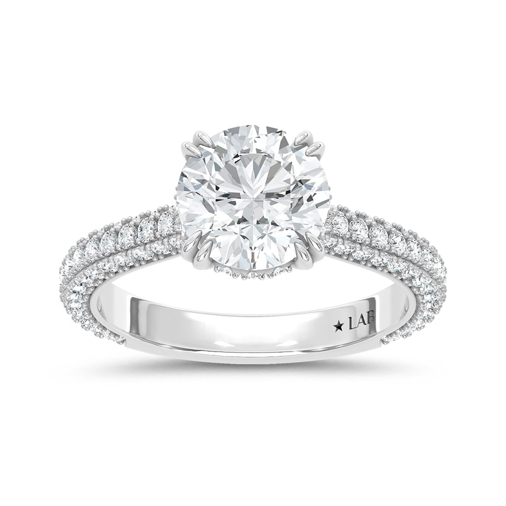 14K White Gold Lab Grown Diamond 2 7/8 Ct.Tw. Round Shape Engagement Ring (Center 2 ctw): 14K White Gold Lab Grown Diamond 2 7/8 Ct.Tw. Round Shape Engagement Ring (Center 2 ctw) Discover subtle brilliance and modern elegance with our Hidden Halo Diamond Engagement Ring. This elegant engag