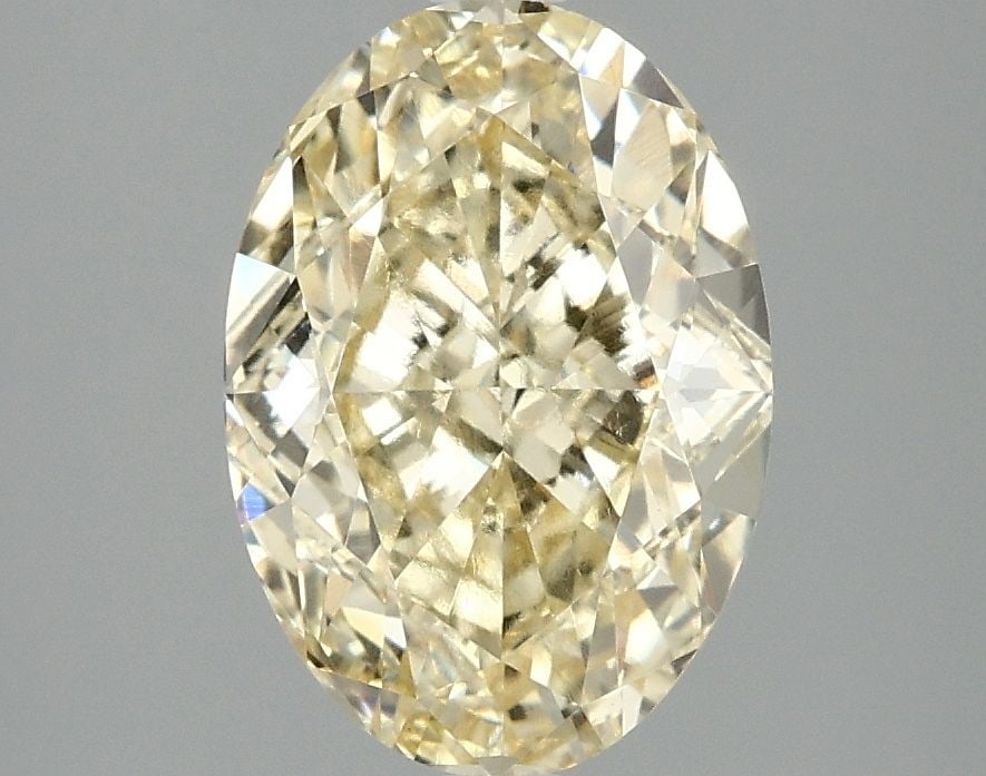 Loose Diamond - OVAL 3.05ct Fancy Vivid Yellow VS1: Loose Diamond - OVAL 3.05ct Fancy Vivid Yellow VS1 Source: This is a real non-mined Diamond that has been grown in a lab Shape: OVAL Carats: 3.05 Color: Fancy Vivid Yellow Certification: IGI Video:
