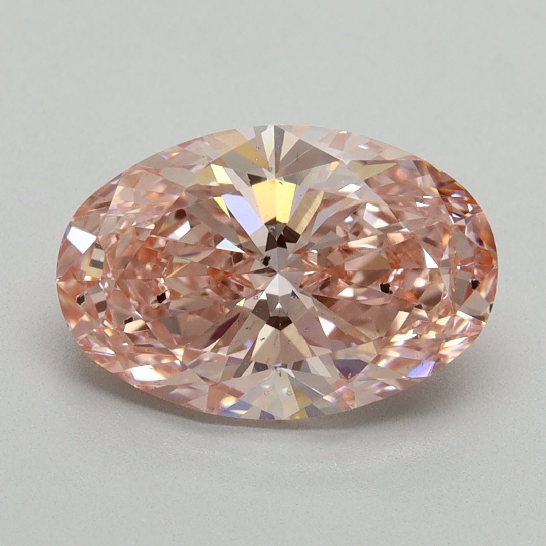 Loose Diamond - OVAL 3.01ct Fancy Vivid Pink SI2: Loose Diamond - OVAL 3.01ct Fancy Vivid Pink SI2 Source: This is a real non-mined Diamond that has been grown in a lab Shape: OVAL Carats: 3.01 Color: Fancy Vivid Pink Certification: IGI Video: