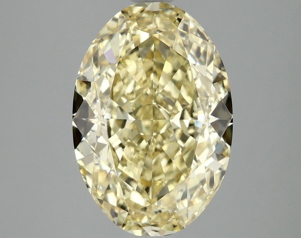 Loose Diamond - OVAL 4.09ct Fancy Vivid Yellow VS1: Loose Diamond - OVAL 4.09ct Fancy Vivid Yellow VS1 Source: This is a real non-mined Diamond that has been grown in a lab Shape: OVAL Carats: 4.09 Color: Fancy Vivid Yellow Certification: IGI Video: