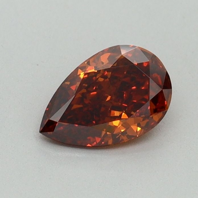 Loose Diamond - PEAR 0.51ct Fancy Vivid Orange VS1: Loose Diamond - PEAR 0.51ct Fancy Vivid Orange VS1 Source: This is a real non-mined Diamond that has been grown in a lab Shape: PEAR Carats: 0.51 Color: Fancy Vivid Orange Certification: IGI Video: