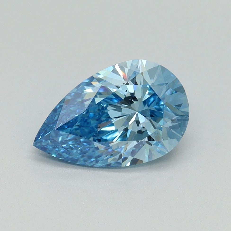 Loose Diamond - PEAR 1.19ct Fancy Vivid Blue VS2: Loose Diamond - PEAR 1.19ct Fancy Vivid Blue VS2 Source: This is a real non-mined Diamond that has been grown in a lab Shape: PEAR Carats: 1.19 Color: Fancy Vivid Blue Certification: IGI Video: