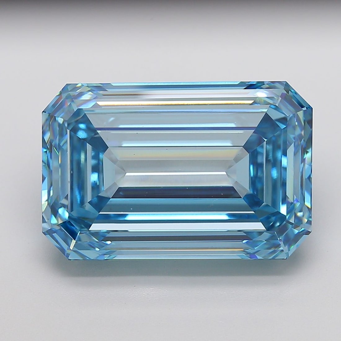 Loose Diamond - EMERALD 26.39ct Fancy Vivid Blue VS1: Loose Diamond - EMERALD 26.39ct Fancy Vivid Blue VS1 Source: This is a real non-mined Diamond that has been grown in a lab Shape: EMERALD Carats: 26.39 Color: Fancy Vivid Blue Certification: IGI Video