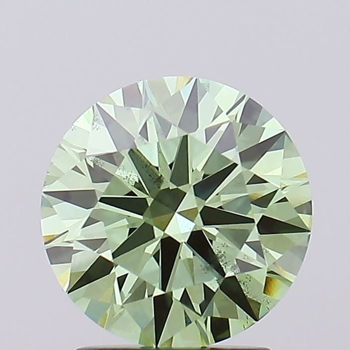 Ideal Loose Diamond - ROUND 2.05ct Fancy Vivid Green VS2: Ideal Loose Diamond - ROUND 2.05ct Fancy Vivid Green VS2 Source: This is a real non-mined Diamond that has been grown in a lab Shape: ROUND Carats: 2.05 Color: Fancy Vivid Green Certification: IGI Vid