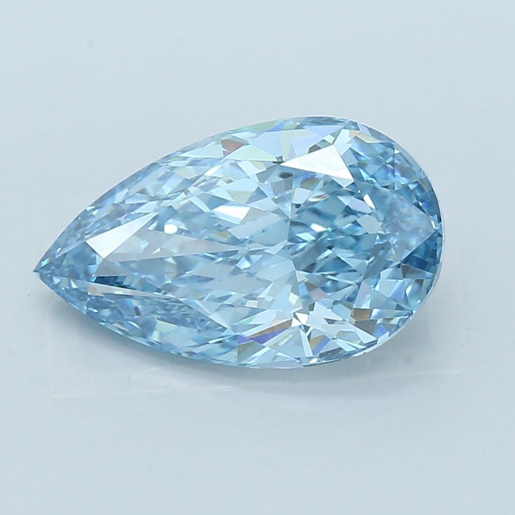 Loose Diamond - PEAR 5.71ct Fancy Vivid Blue VVS2: Loose Diamond - PEAR 5.71ct Fancy Vivid Blue VVS2 Source: This is a real non-mined Diamond that has been grown in a lab Shape: PEAR Carats: 5.71 Color: Fancy Vivid Blue Certification: IGI Video: