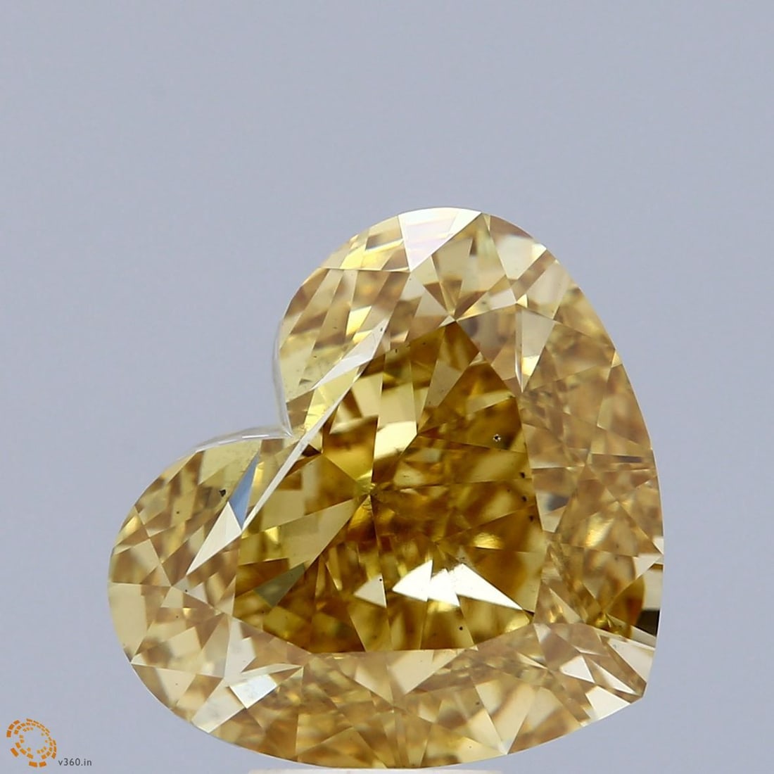 Loose Diamond - HEART 10.05ct Fancy Vivid Yellow VS2: Loose Diamond - HEART 10.05ct Fancy Vivid Yellow VS2 Source: This is a real non-mined Diamond that has been grown in a lab Shape: HEART Carats: 10.05 Color: Fancy Vivid Yellow Certification: IGI