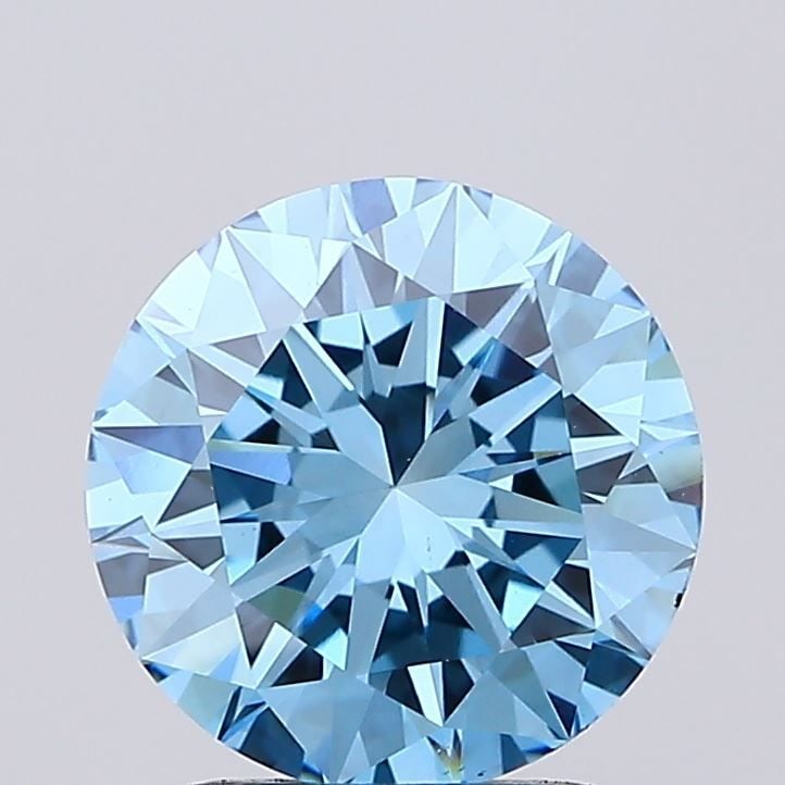 Loose Diamond - ROUND 1.71ct Fancy Vivid Blue VS1: Loose Diamond - ROUND 1.71ct Fancy Vivid Blue VS1 Source: This is a real non-mined Diamond that has been grown in a lab Shape: ROUND Carats: 1.71 Color: Fancy Vivid Blue Certification: IGI Video: