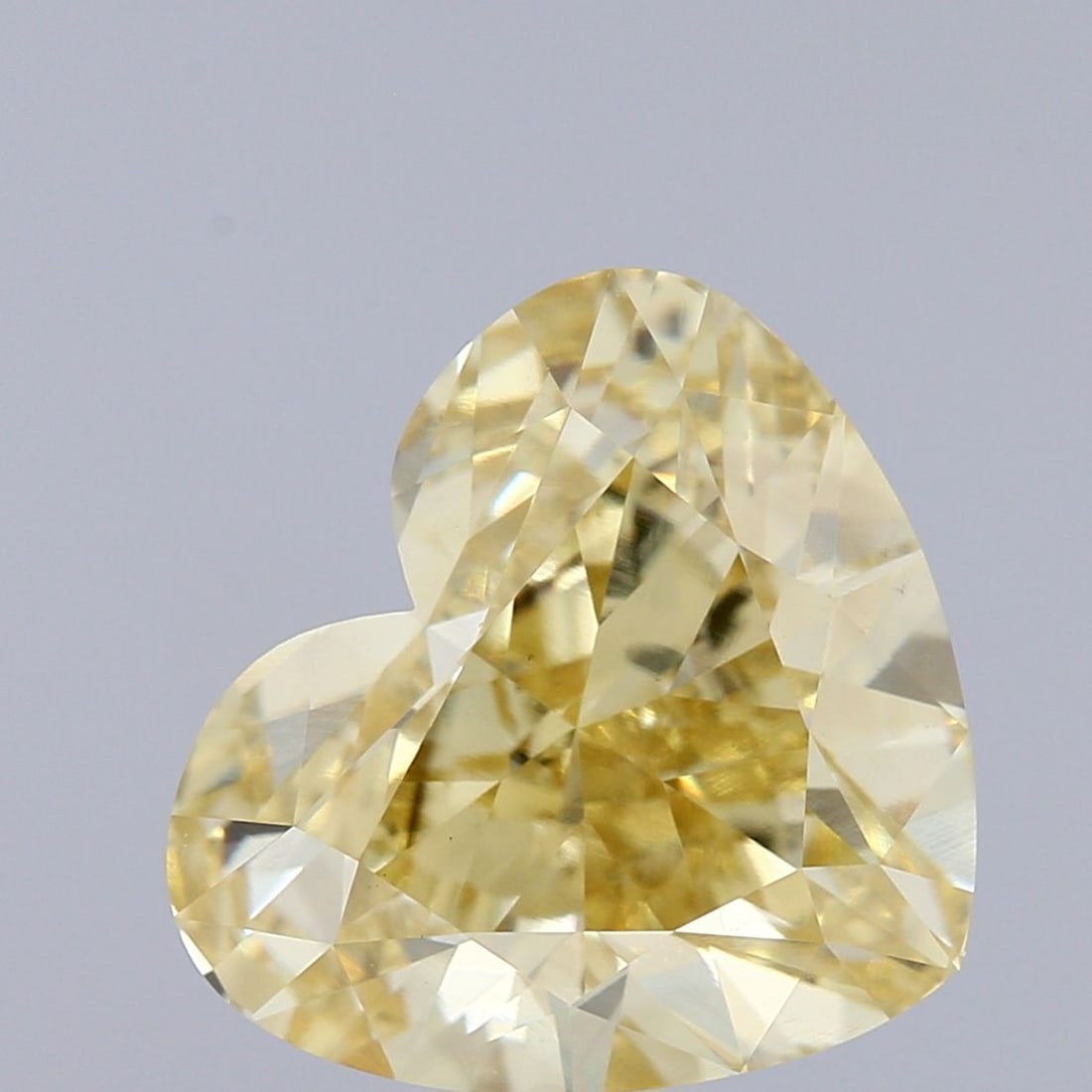Loose Diamond - HEART 5.0ct Fancy Yellow VS1: Loose Diamond - HEART 5.0ct Fancy Yellow VS1 Source: This is a real non-mined Diamond that has been grown in a lab Shape: HEART Carats: 5.0 Color: Fancy Yellow Certification: IGI Video: