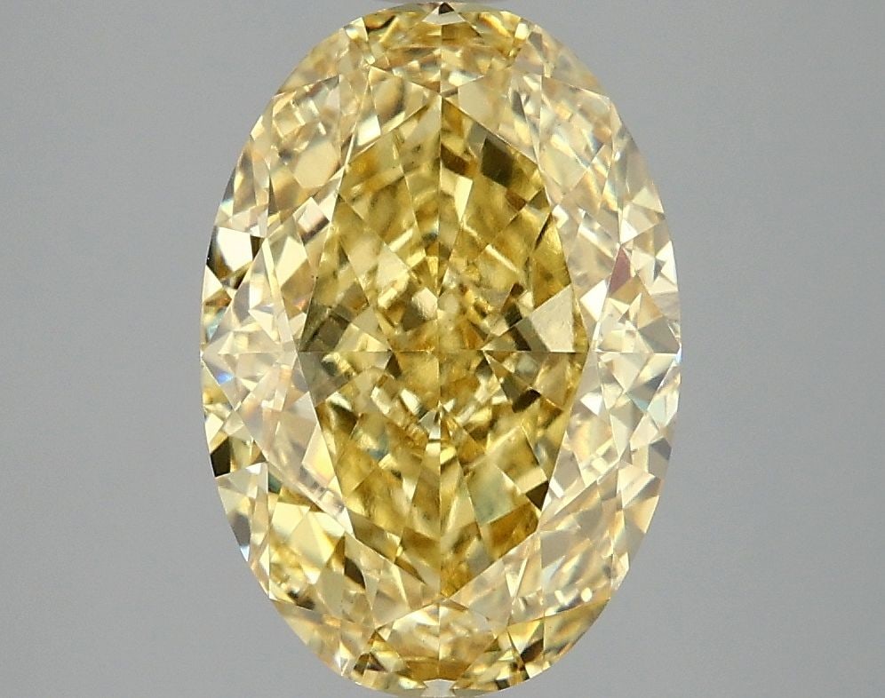 Loose Diamond - OVAL 4.1ct Fancy Vivid Yellow VS1: Loose Diamond - OVAL 4.1ct Fancy Vivid Yellow VS1 Source: This is a real non-mined Diamond that has been grown in a lab Shape: OVAL Carats: 4.1 Color: Fancy Vivid Yellow Certification: IGI Video: