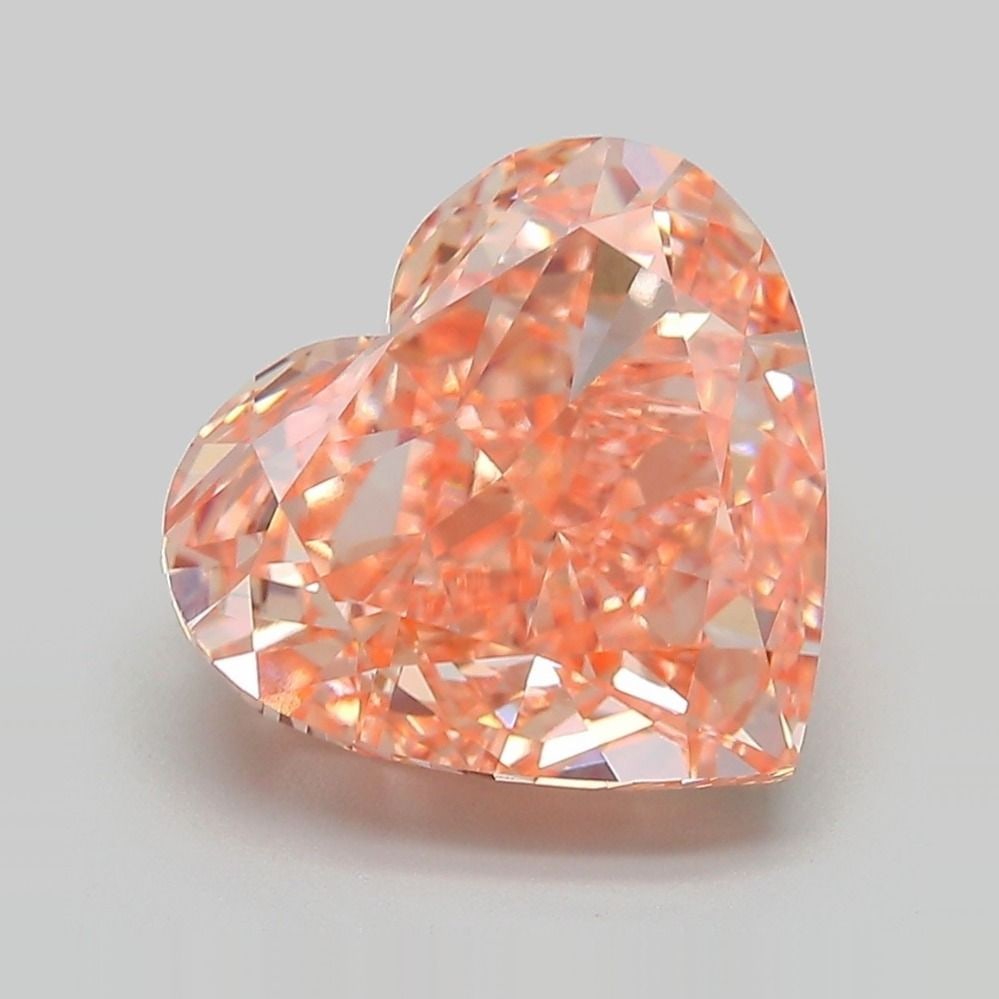 Loose Diamond - HEART 5.36ct Fancy Vivid Pinkish Orange VVS2: Loose Diamond - HEART 5.36ct Fancy Vivid Pinkish Orange VVS2 Source: This is a real non-mined Diamond that has been grown in a lab Shape: HEART Carats: 5.36 Color: Fancy Vivid Pinkish Orange Certifica