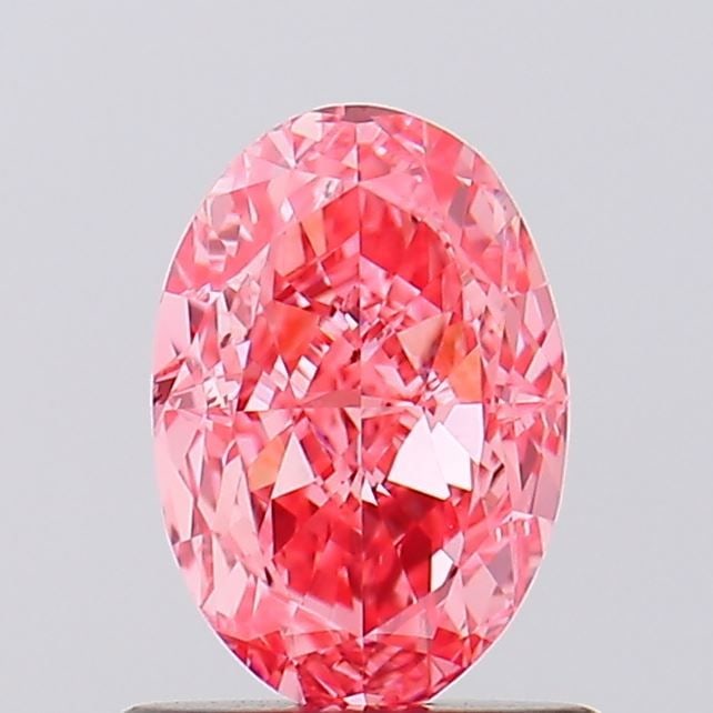 Loose Diamond - OVAL 1.05ct Fancy Vivid Pink VS2: Loose Diamond - OVAL 1.05ct Fancy Vivid Pink VS2 Source: This is a real non-mined Diamond that has been grown in a lab Shape: OVAL Carats: 1.05 Color: Fancy Vivid Pink Certification: IGI Video: