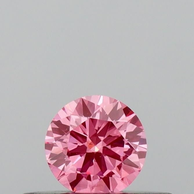 Loose Diamond - ROUND 0.19ct Fancy Vivid Pink VS1: Loose Diamond - ROUND 0.19ct Fancy Vivid Pink VS1 Source: This is a real non-mined Diamond that has been grown in a lab Shape: ROUND Carats: 0.19 Color: Fancy Vivid Pink Certification: IGI Video: