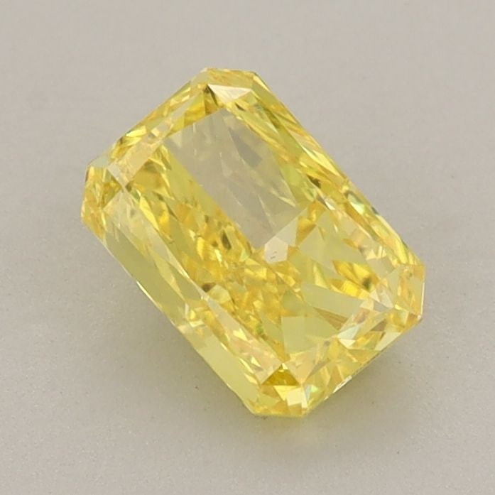 Loose Diamond - RADIANT 0.88ct Fancy Vivid Yellow VS2: Loose Diamond - RADIANT 0.88ct Fancy Vivid Yellow VS2 Source: This is a real non-mined Diamond that has been grown in a lab Shape: RADIANT Carats: 0.88 Color: Fancy Vivid Yellow Certification: IGI Vid