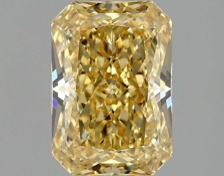 Loose Diamond - RADIANT 1.59ct Fancy Vivid Yellow VS2: Loose Diamond - RADIANT 1.59ct Fancy Vivid Yellow VS2 Source: This is a real non-mined Diamond that has been grown in a lab Shape: RADIANT Carats: 1.59 Color: Fancy Vivid Yellow Certification: IGI Vid