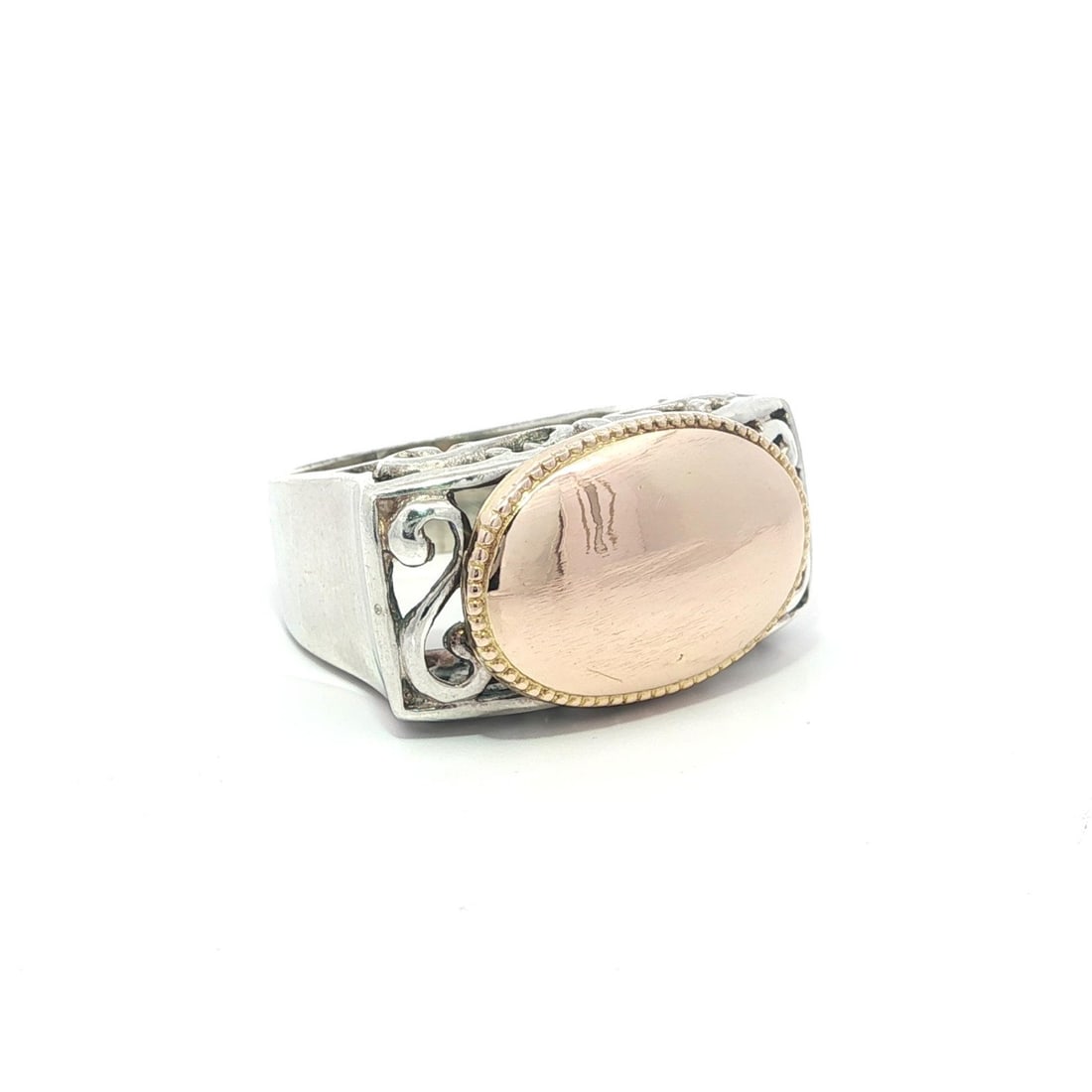 Vintage Handmade Sterling Silver 10k Rose Gold Signet Ring Size 7.5: Vintage Handmade Sterling Silver 10k Rose Gold Signet Ring Size 7.5 This exquisite vintage handmade signet band ring showcases a captivating blend of sterling silver and 10k rose gold. Designed in an
