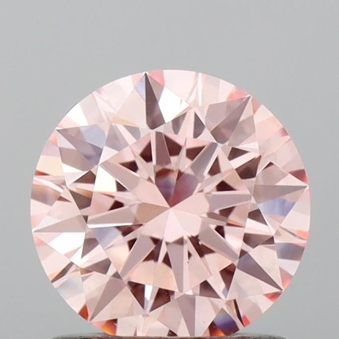 Loose Diamond - ROUND 0.92ct Fancy Intense Pink VS1: Loose Diamond - ROUND 0.92ct Fancy Intense Pink VS1 Source: This is a real non-mined Diamond that has been grown in a lab Shape: ROUND Carats: 0.92 Color: Fancy Intense Pink Certification: IGI Video: