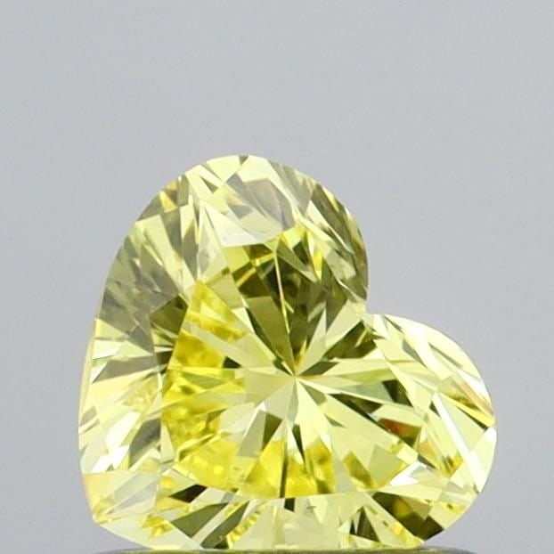 Loose Diamond - HEART 0.61ct Fancy Vivid Yellow VS2: Loose Diamond - HEART 0.61ct Fancy Vivid Yellow VS2 Source: This is a real non-mined Diamond that has been grown in a lab Shape: HEART Carats: 0.61 Color: Fancy Vivid Yellow Certification: IGI