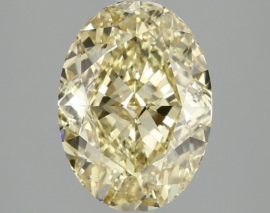 Loose Diamond - OVAL 3.0ct Fancy Vivid Yellow VS1: Loose Diamond - OVAL 3.0ct Fancy Vivid Yellow VS1 Source: This is a real non-mined Diamond that has been grown in a lab Shape: OVAL Carats: 3.0 Color: Fancy Vivid Yellow Certification: IGI Video: