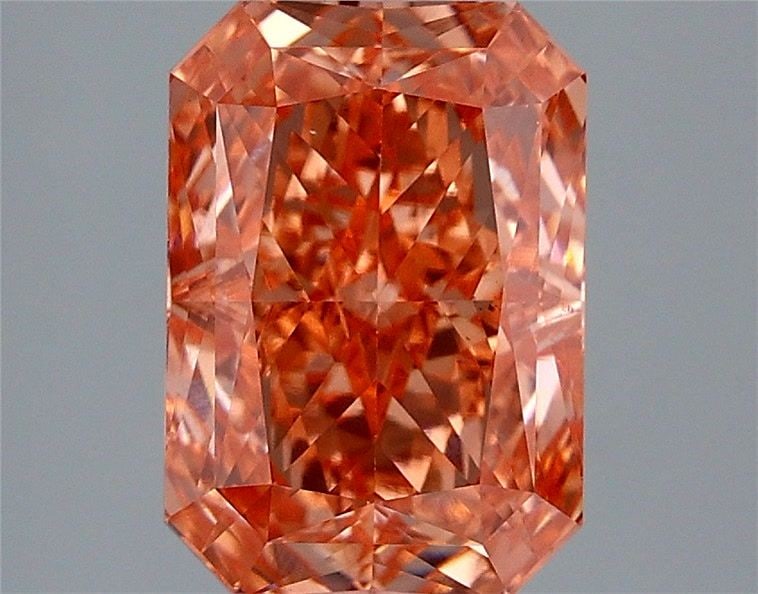 Loose Diamond - RADIANT 3.0ct Fancy Vivid Orangey Pink VS1: Loose Diamond - RADIANT 3.0ct Fancy Vivid Orangey Pink VS1 Source: This is a real non-mined Diamond that has been grown in a lab Shape: RADIANT Carats: 3.0 Color: Fancy Vivid Orangey Pink Certificatio