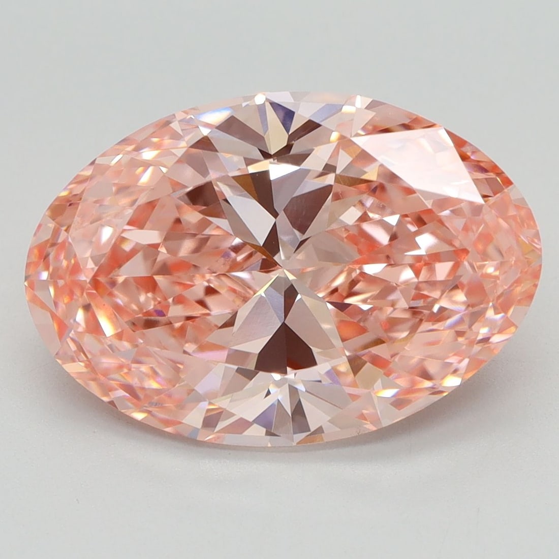 Loose Diamond - OVAL 5.07ct Fancy Vivid Pink VVS2: Loose Diamond - OVAL 5.07ct Fancy Vivid Pink VVS2 Source: This is a real non-mined Diamond that has been grown in a lab Shape: OVAL Carats: 5.07 Color: Fancy Vivid Pink Certification: IGI Video: