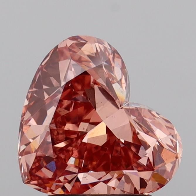 Loose Diamond - HEART 2.2ct Fancy Pinkish Brown VS2: Loose Diamond - HEART 2.2ct Fancy Pinkish Brown VS2 Source: This is a real non-mined Diamond that has been grown in a lab Shape: HEART Carats: 2.2 Color: Fancy Pinkish Brown Certification: IGI Video: