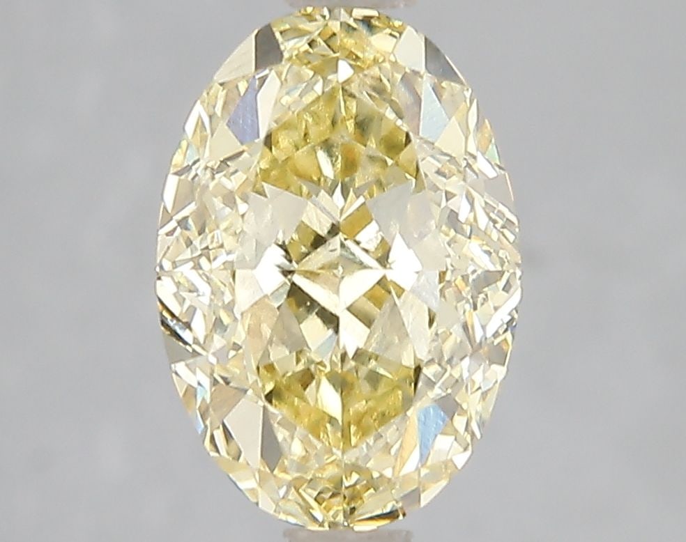 Loose Diamond - OVAL 3.03ct Fancy Intense Yellow VS2: Loose Diamond - OVAL 3.03ct Fancy Intense Yellow VS2 Source: This is a real non-mined Diamond that has been grown in a lab Shape: OVAL Carats: 3.03 Color: Fancy Intense Yellow Certification: IGI Video