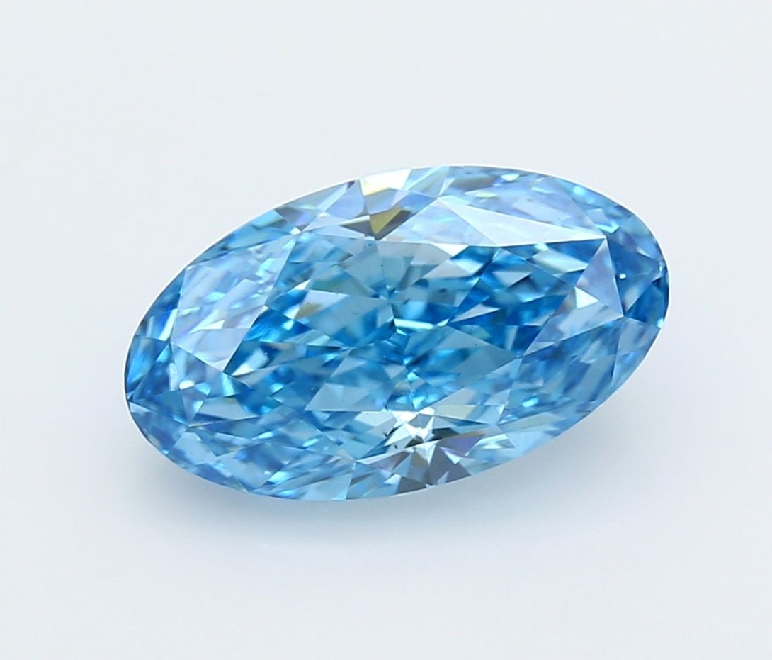 Loose Diamond - OVAL 3.87ct Fancy Vivid Blue VS2: Loose Diamond - OVAL 3.87ct Fancy Vivid Blue VS2 Source: This is a real non-mined Diamond that has been grown in a lab Shape: OVAL Carats: 3.87 Color: Fancy Vivid Blue Certification: IGI Video: