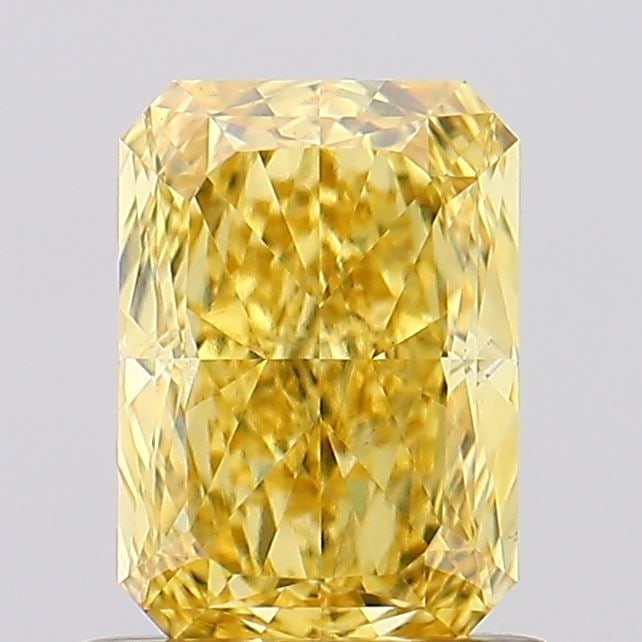 Loose Diamond - RADIANT 1.07ct Fancy Vivid Yellow VS1: Loose Diamond - RADIANT 1.07ct Fancy Vivid Yellow VS1 Source: This is a real non-mined Diamond that has been grown in a lab Shape: RADIANT Carats: 1.07 Color: Fancy Vivid Yellow Certification: IGI Vid