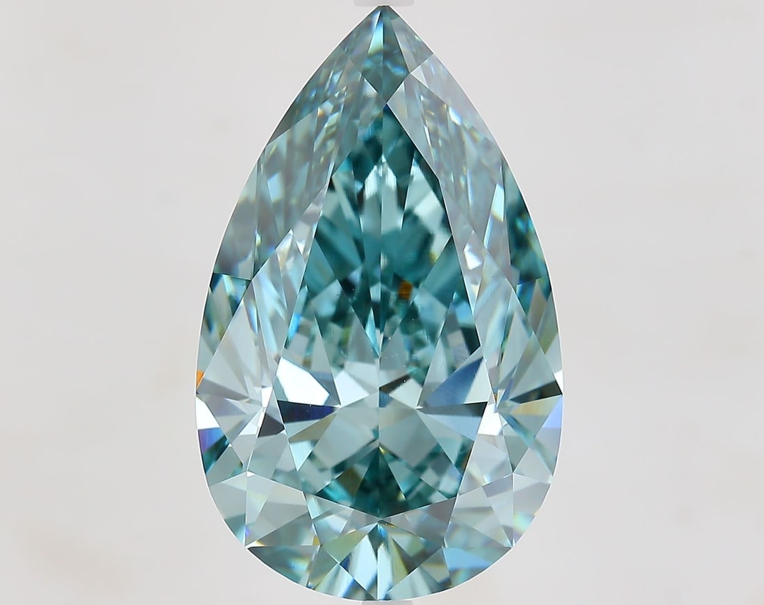Loose Diamond - PEAR 14.05ct Fancy Vivid Blue VS1: Loose Diamond - PEAR 14.05ct Fancy Vivid Blue VS1 Source: This is a real non-mined Diamond that has been grown in a lab Shape: PEAR Carats: 14.05 Color: Fancy Vivid Blue Certification: IGI Video: