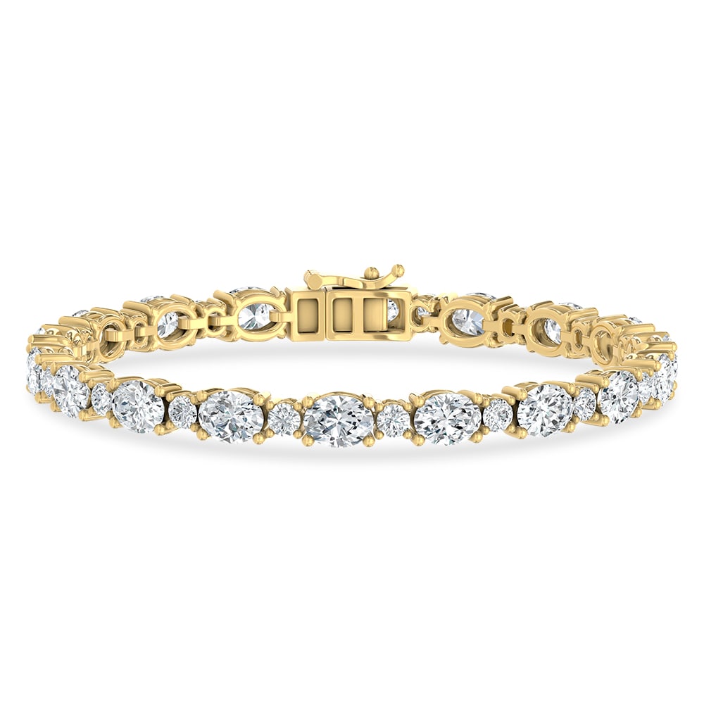 14K Yellow Gold Lab Grown Diamond 11 Ct.Tw. Oavl and Round Fancy Bracelet: 14K Yellow Gold Lab Grown Diamond 11 Ct.Tw. Oavl and Round Fancy Bracelet Crafted in sleek 14K Yellow Gold, this oval and round fancy bracelet is adorned with lab grown diamonds totaling 11 Ct.Tw., de