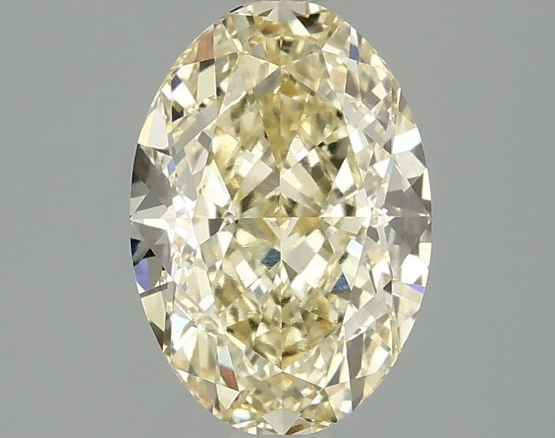 Loose Diamond - OVAL 2.1ct Fancy Intense Yellow VVS2: Loose Diamond - OVAL 2.1ct Fancy Intense Yellow VVS2 Source: This is a real non-mined Diamond that has been grown in a lab Shape: OVAL Carats: 2.1 Color: Fancy Intense Yellow Certification: IGI Video: