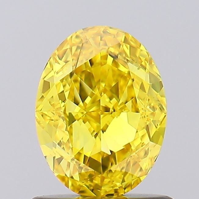 Loose Diamond - OVAL 1.01ct Fancy Vivid Yellow VS1: Loose Diamond - OVAL 1.01ct Fancy Vivid Yellow VS1 Source: This is a real non-mined Diamond that has been grown in a lab Shape: OVAL Carats: 1.01 Color: Fancy Vivid Yellow Certification: IGI Video: