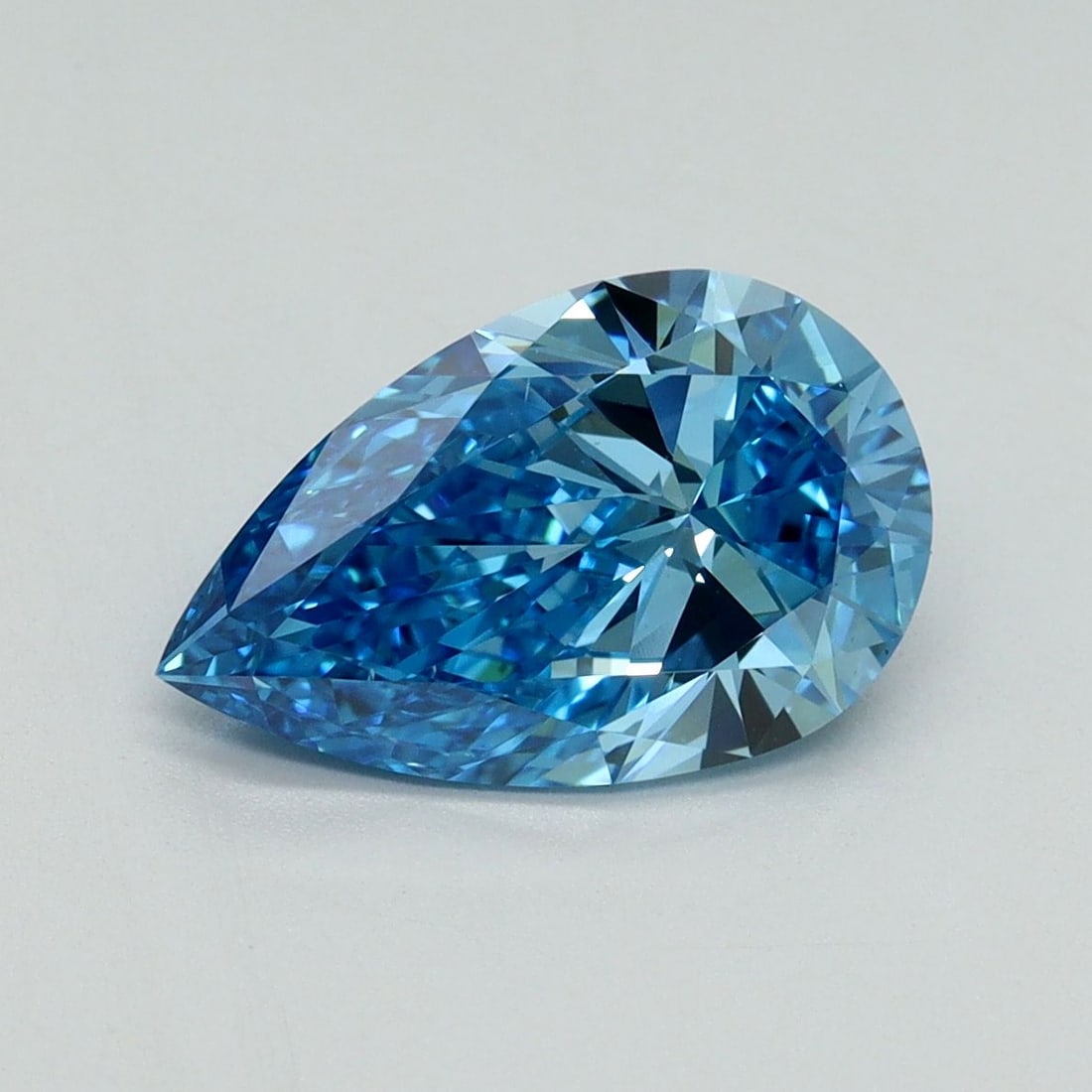 Loose Diamond - PEAR 2.14ct Fancy Vivid Blue VS1: Loose Diamond - PEAR 2.14ct Fancy Vivid Blue VS1 Source: This is a real non-mined Diamond that has been grown in a lab Shape: PEAR Carats: 2.14 Color: Fancy Vivid Blue Certification: IGI Video: