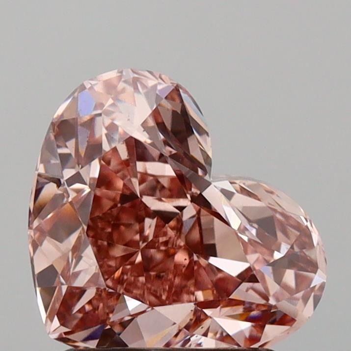 Loose Diamond - HEART 1.55ct Fancy Intense Brownish Pink VS2: Loose Diamond - HEART 1.55ct Fancy Intense Brownish Pink VS2 Source: This is a real non-mined Diamond that has been grown in a lab Shape: HEART Carats: 1.55 Color: Fancy Intense Brownish Pink Certific