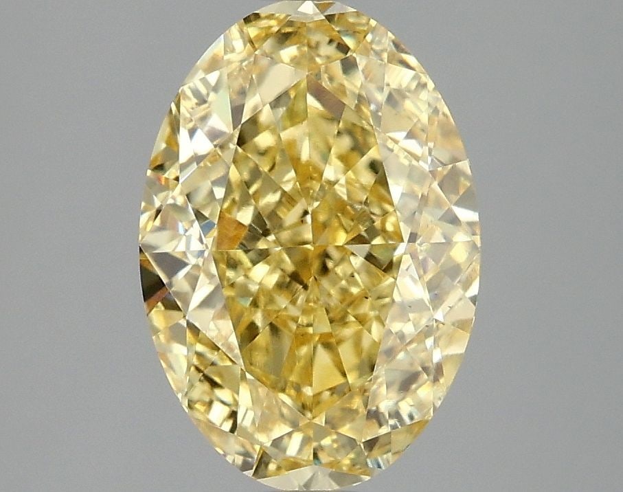 Loose Diamond - OVAL 3.08ct Fancy Vivid Yellow VS2: Loose Diamond - OVAL 3.08ct Fancy Vivid Yellow VS2 Source: This is a real non-mined Diamond that has been grown in a lab Shape: OVAL Carats: 3.08 Color: Fancy Vivid Yellow Certification: IGI Video: