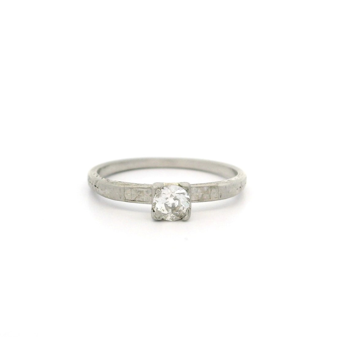 Art Deco Platinum .26ct VS2 Diamond Wheat Work Solitaire Ring: Art Deco Platinum .26ct VS2 Diamond Wheat Work Solitaire Ring This exquisite Art Deco solitaire ring showcases a stunning .26ct old European cut diamond, prong set in solid platinum. With a diamond co