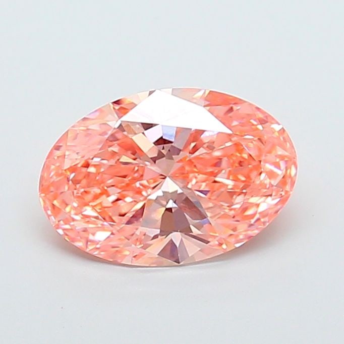 Loose Diamond - OVAL 3.01ct Fancy Vivid Orangey Pink VS1: Loose Diamond - OVAL 3.01ct Fancy Vivid Orangey Pink VS1 Source: This is a real non-mined Diamond that has been grown in a lab Shape: OVAL Carats: 3.01 Color: Fancy Vivid Orangey Pink Certification: I