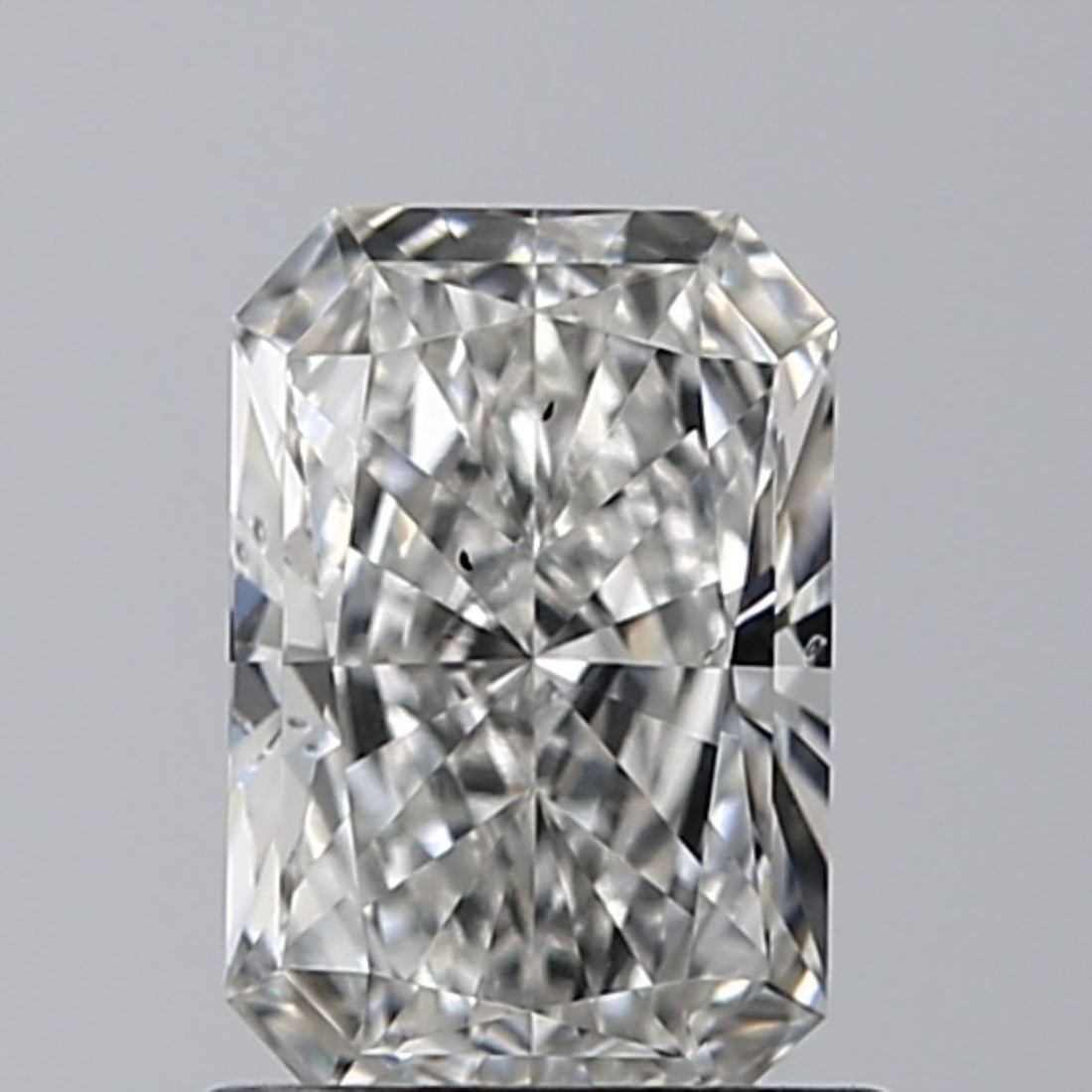Loose Diamond - RADIANT 0.9ct G VS2: Loose Diamond - RADIANT 0.9ct G VS2 Source: This is a real non-mined Diamond that has been grown in a lab Shape: RADIANT Carats: 0.9 Color: G Clarity: VS2 Certification: IGI Video:
