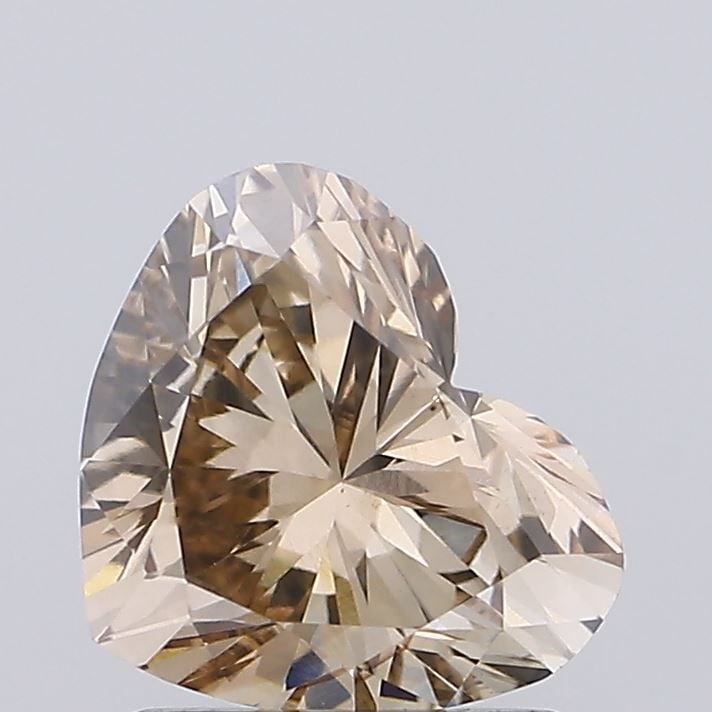 Loose Diamond - HEART 1.21ct Fancy Light Brown VS1: Loose Diamond - HEART 1.21ct Fancy Light Brown VS1 Source: This is a real non-mined Diamond that has been grown in a lab Shape: HEART Carats: 1.21 Color: Fancy Light Brown Certification: IGI Video: