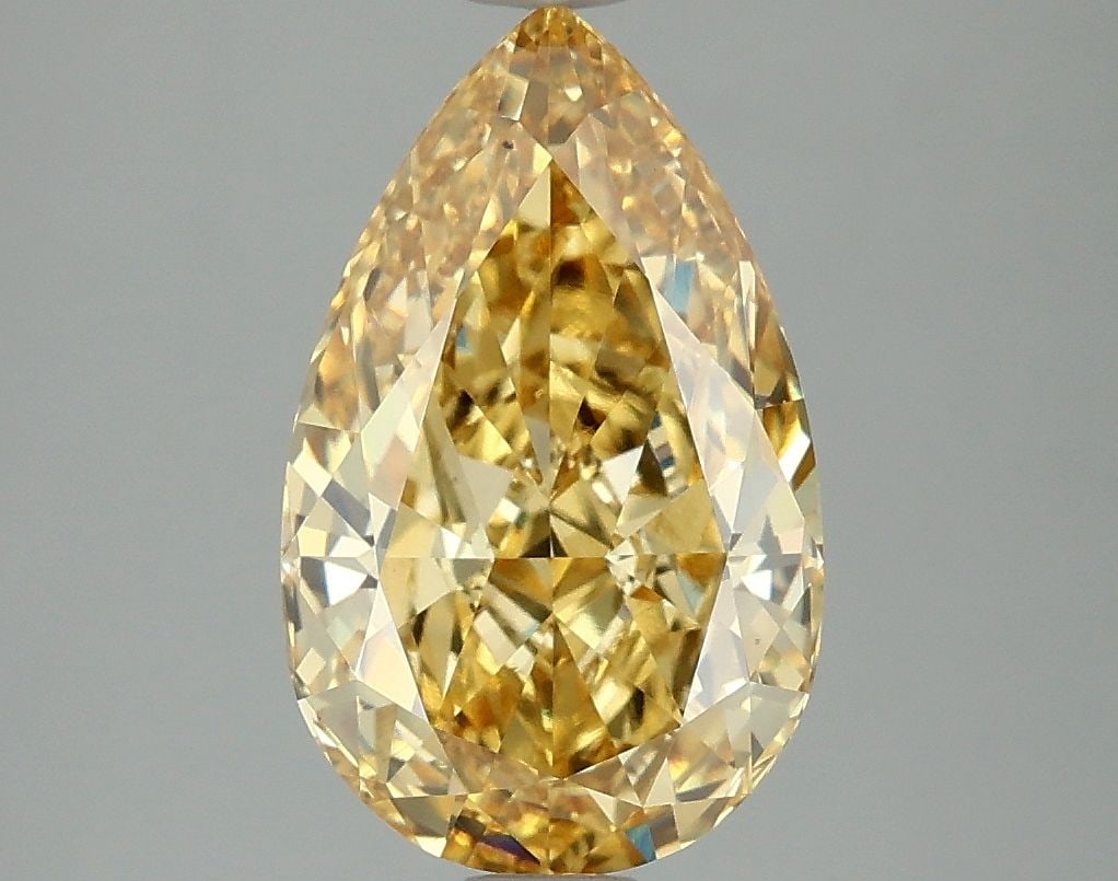 Loose Diamond - PEAR 3.0ct Fancy Vivid Yellow VS1: Loose Diamond - PEAR 3.0ct Fancy Vivid Yellow VS1 Source: This is a real non-mined Diamond that has been grown in a lab Shape: PEAR Carats: 3.0 Color: Fancy Vivid Yellow Certification: IGI Video: