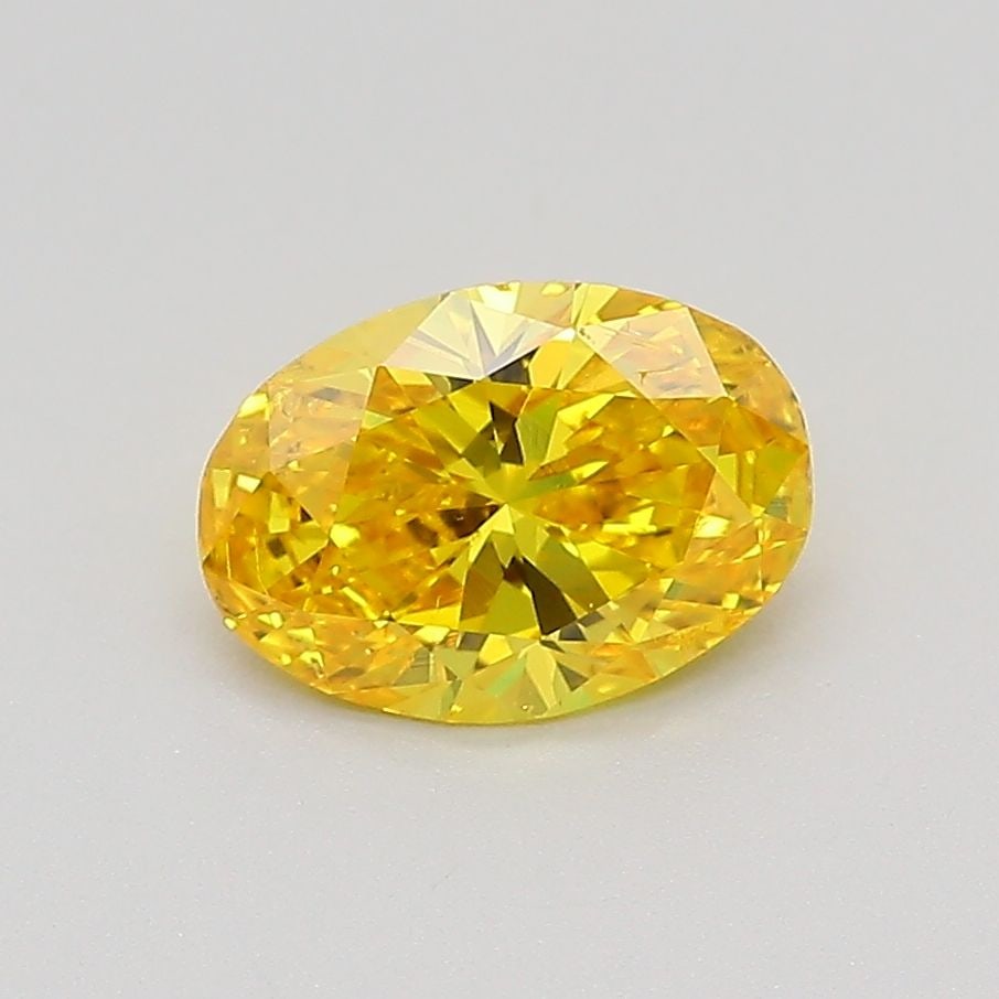 Loose Diamond - OVAL 0.99ct Fancy Vivid Yellow SI2: Loose Diamond - OVAL 0.99ct Fancy Vivid Yellow SI2 Source: This is a real non-mined Diamond that has been grown in a lab Shape: OVAL Carats: 0.99 Color: Fancy Vivid Yellow Certification: IGI Video: