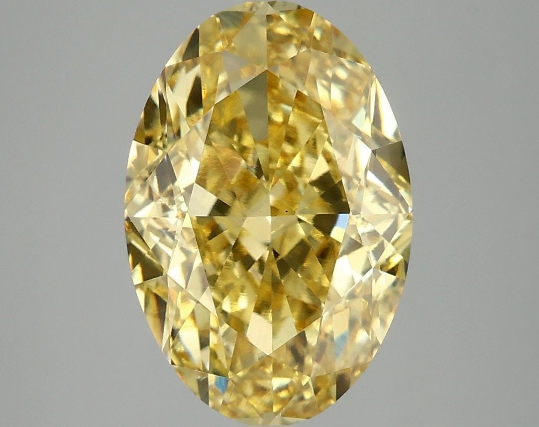Loose Diamond - OVAL 4.86ct Fancy Vivid Yellow VS1: Loose Diamond - OVAL 4.86ct Fancy Vivid Yellow VS1 Source: This is a real non-mined Diamond that has been grown in a lab Shape: OVAL Carats: 4.86 Color: Fancy Vivid Yellow Certification: IGI Video: