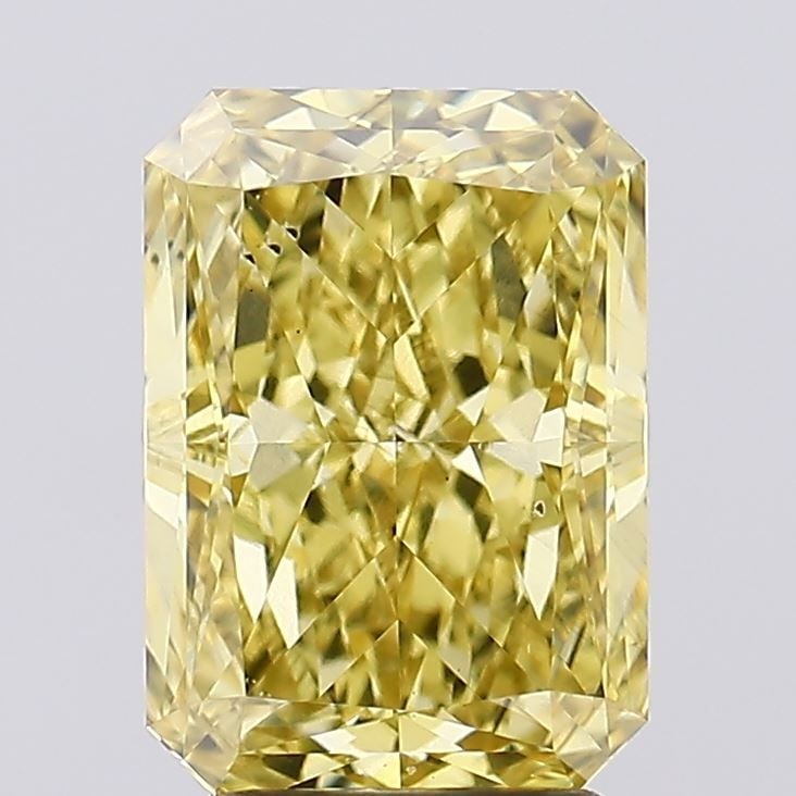 Loose Diamond - RADIANT 3.53ct Fancy Vivid Yellow VS2: Loose Diamond - RADIANT 3.53ct Fancy Vivid Yellow VS2 Source: This is a real non-mined Diamond that has been grown in a lab Shape: RADIANT Carats: 3.53 Color: Fancy Vivid Yellow Certification: IGI Vid