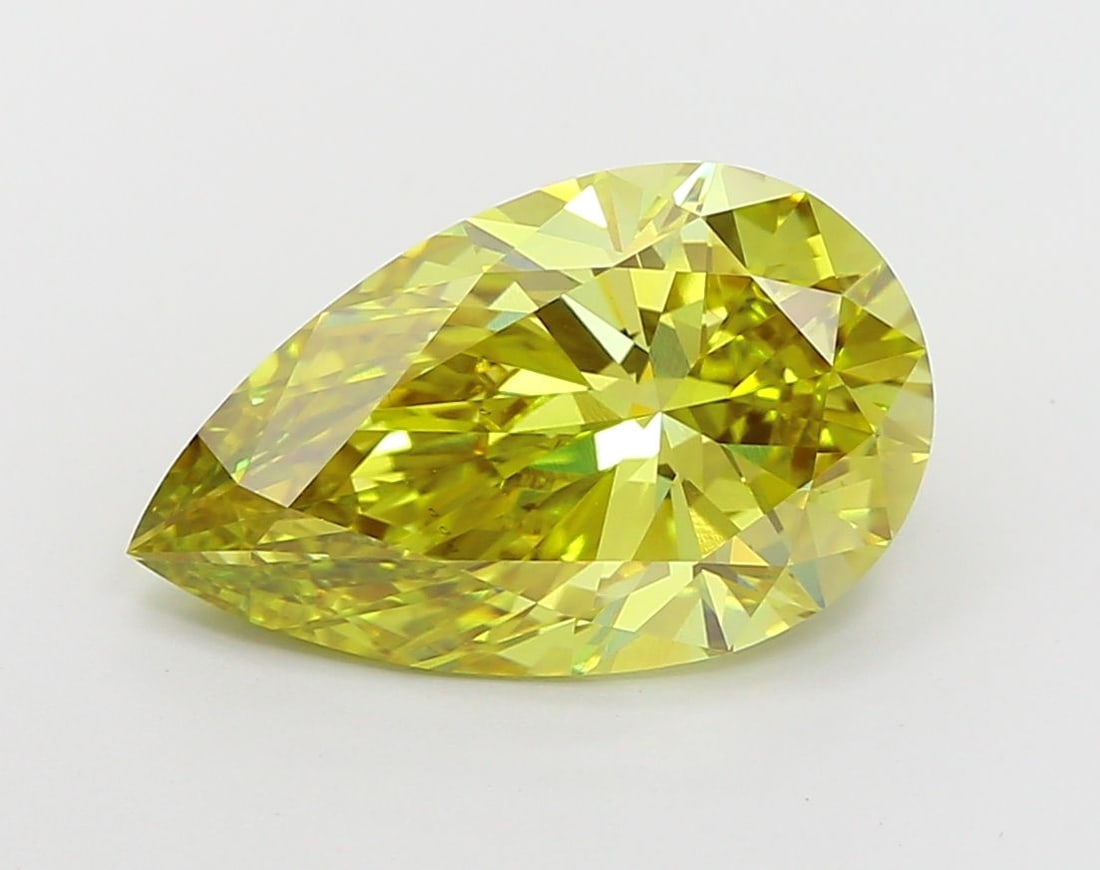 Loose Diamond - PEAR 5.01ct Fancy Vivid Greenish Yellow VS1: Loose Diamond - PEAR 5.01ct Fancy Vivid Greenish Yellow VS1 Source: This is a real non-mined Diamond that has been grown in a lab Shape: PEAR Carats: 5.01 Color: Fancy Vivid Greenish Yellow Certificat