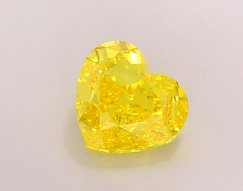 Loose Diamond - HEART 1.99ct Fancy Vivid Yellow VS1: Loose Diamond - HEART 1.99ct Fancy Vivid Yellow VS1 Source: This is a real non-mined Diamond that has been grown in a lab Shape: HEART Carats: 1.99 Color: Fancy Vivid Yellow Certification: IGI Video: