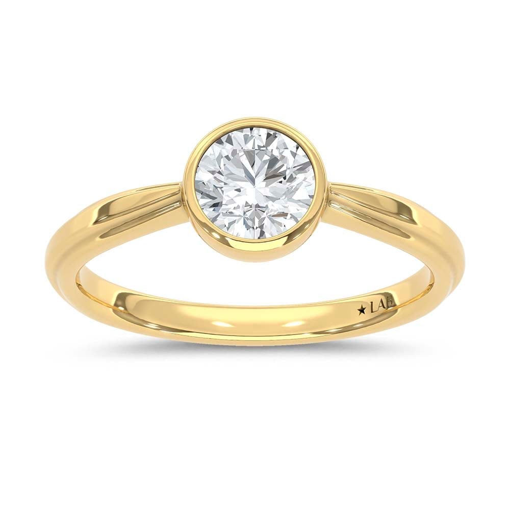 14K Yellow Gold Lab Grown Diamond 3/4 Ct.Tw. Promise Ring: 14K Yellow Gold Lab Grown Diamond 3/4 Ct.Tw. Promise Ring Designed in classic 14K Yellow Gold, this promise ring features lab grown diamonds totaling 3/4 Ct.Tw., blending timeless romance with sparkle